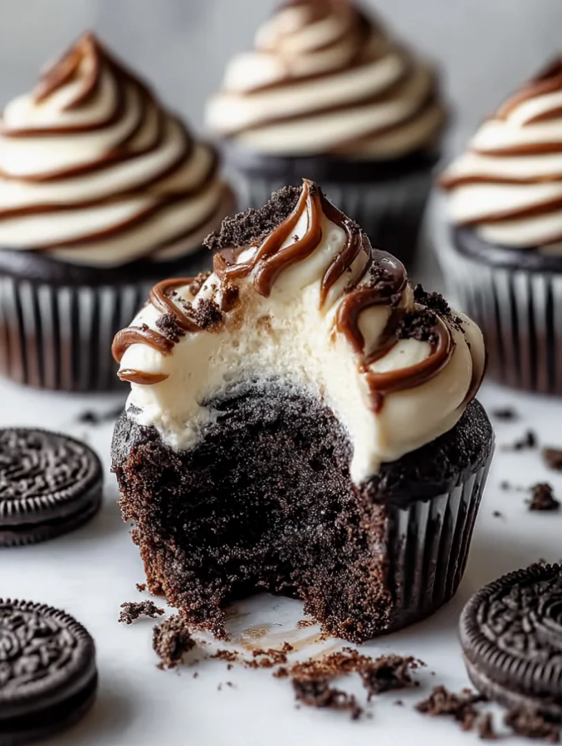 Decadent Fudge Swirled Oreo Bottom Cheesecake Cupcakes